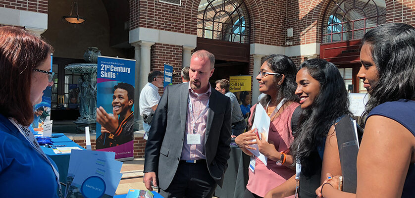 Rachel talking to students at job fair