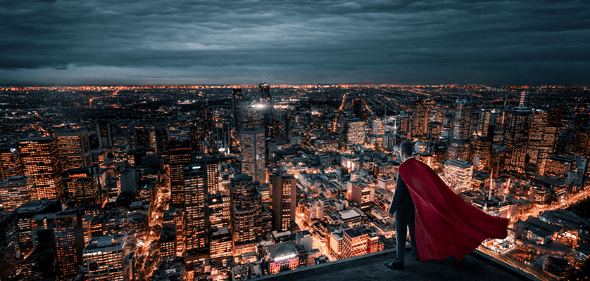 Superhero overlooks city